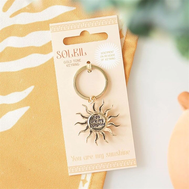Porte-clés soleil doré