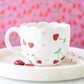 Tasse cerise festonnée